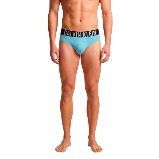 Swim Briefs by Calvin Klein Jeans for men in polypropylene & lycra blue features an beach chic silhouette, showcasing the beach chic Men's Polypropylene & Lycra Swim Briefs design with a streamlined fit ideal for performance and style.