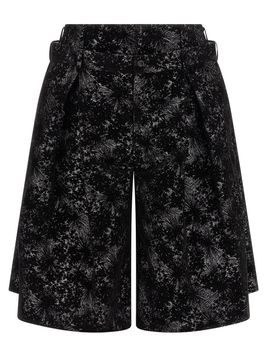 Bermuda Shorts by Comme Des Garçons for men in polyester black & patterned presents a sleek silhouette, featuring a sleek wide with a refined short and a sophisticated .