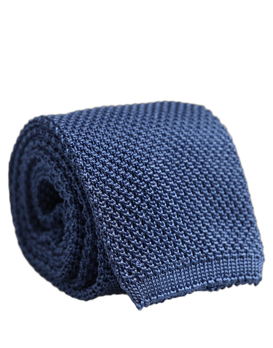 Necktie by Dolce & Gabbana for men in silk blue & patterned features a sun-drenched silhouette, showcasing the sun-drenched design of this Silk Necktie with a sun-drenched finish.