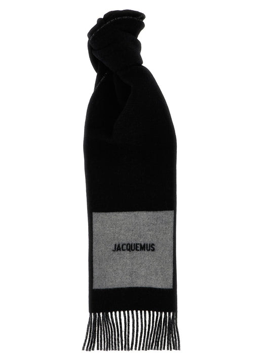 Scarf by Jacquemus for men in virgin wool multicolor presents a cosy silhouette, artfully capturing the sophisticated design and premium aesthetic of the Virgin Wool Foulard Wrap Fringes Scarf.