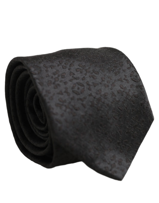 Necktie by Dolce & Gabbana for men in polyester & silk black & patterned showcases a stately silhouette, expertly detailed with a stately finish that perfectly captures the sophisticated essence of the Polyester & Silk Necktie.
