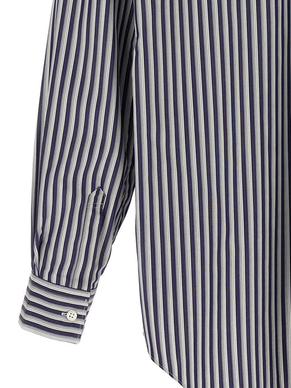 Shirt by Comme Des Garçons for men in cotton gray, navy, patterned & striped showcases a sleek silhouette, elegantly detailed with a sleek and for a sleek finish.