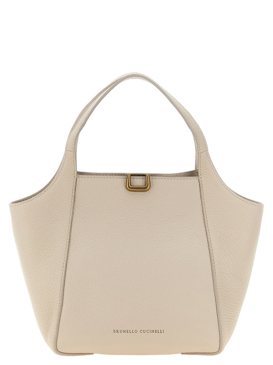 This Bucket Handbag by Brunello Cucinelli for women in suede leather and beige presents a sculptural silhouette featuring a secure magnetic, ample internal-pockets & cardholder, and versatile shoulder-strap, handle, adjustable-strap & detachable-strap for a sculptural finish.