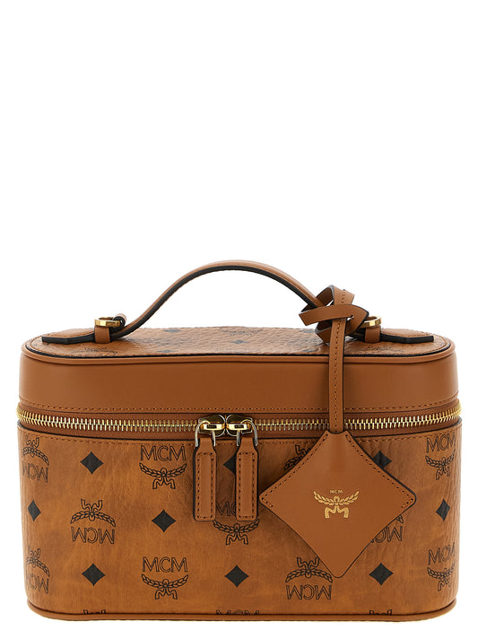 Crossbody Vanity Handbag by MCM for women in coated canvas nappa & suede leather black, brown, gold & monogram features a versatile chic silhouette, meticulously detailed with a secure zipper, ample , and versatile crossbody-strap, shoulder-strap, handle, adjustable-strap & detachable-strap.