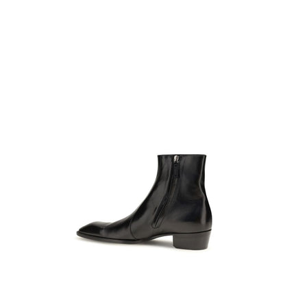 Cuban Ankle Boots by Saint Laurent for men in bos taurus calfskin leather black features an effortless chic silhouette from the Blake Men's Bos Taurus Calfskin Leather Cuban Ankle Boots collection, showcasing a effortless chic cuban-heel and refined for an effortless chic look.
