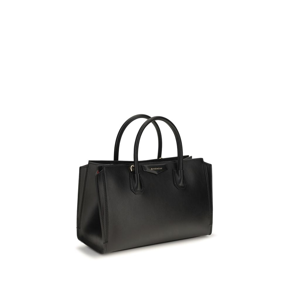 Small Crossbody Handbag by Givenchy for women in bos taurus grained & suede calfskin leather black, gold & signature features a signature silhouette, showcasing a secure magnetic and signature with versatile crossbody-strap, shoulder-strap, detachable-strap & handle for a sophisticated look.