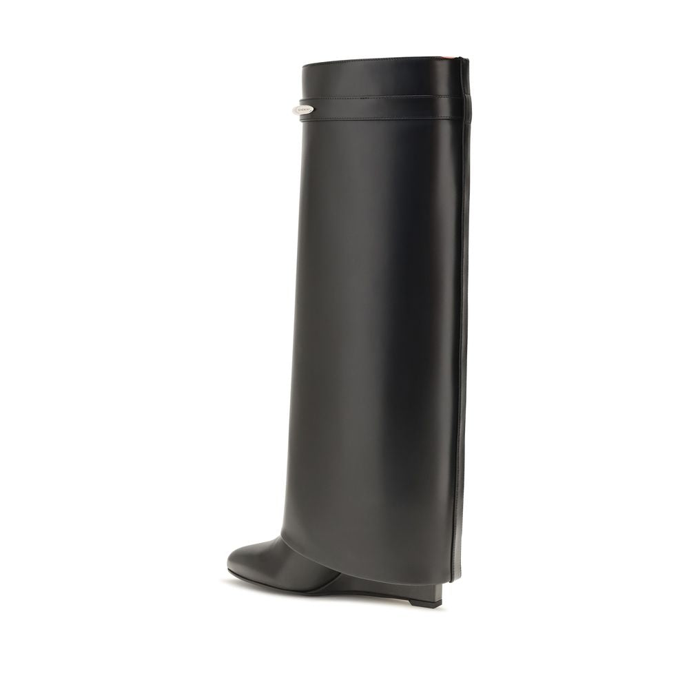 Wedge Boots by Givenchy for women in bos taurus calf leather black & gold features an effortless chic silhouette from the Women's Bos Taurus Calf Leather Wedge Boots collection, showcasing a effortless chic wedge and refined pointed toe style for an effortless chic look.