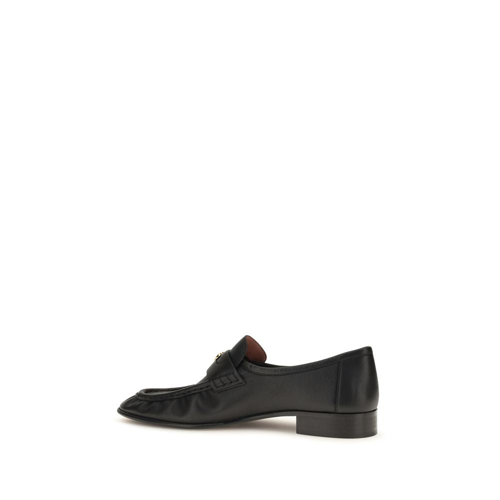 Flat Loafer Slip-On Strap Shoes by Chloé for women in bos taurus calf leather black & signature features an dynamic silhouette from the Women's Bos Taurus Calf Leather Flat Loafer Slip-On Strap Shoes collection, defined by a dynamic and flat for a dynamic look.