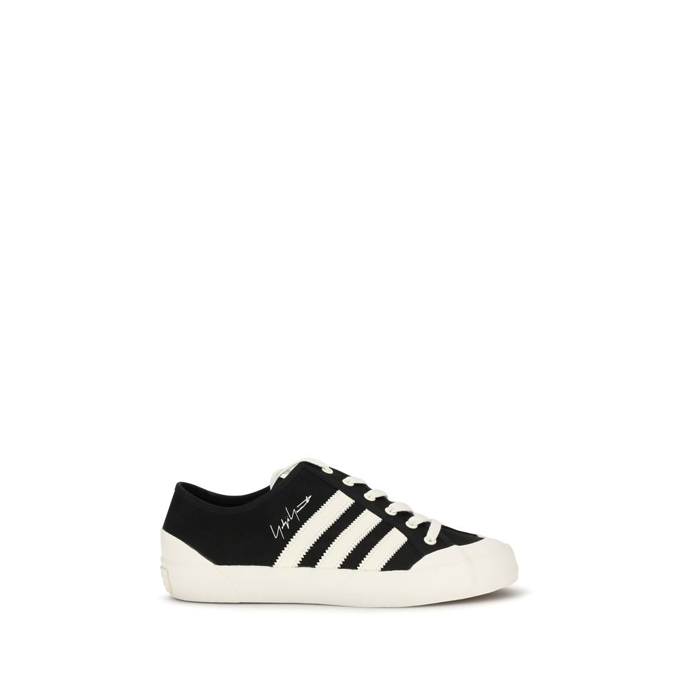 Sneakers by Y-3 for men in bos taurus calf leather & rubber black features an timeless silhouette from the Men's Low Top Bos Taurus Calf Leather & Rubber Sneakers collection, showcasing a signature low-top style with an timeless finish.