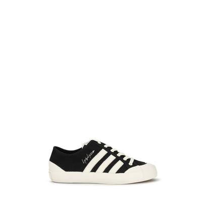 Sneakers by Y-3 for men in bos taurus calf leather & rubber black features an timeless silhouette from the Men's Low Top Bos Taurus Calf Leather & Rubber Sneakers collection, showcasing a signature low-top style with an timeless finish.