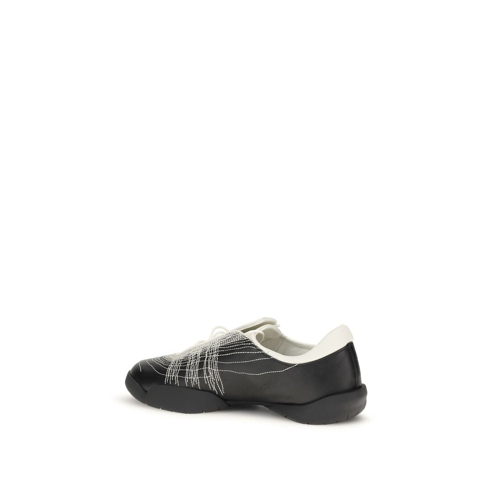 Athletic Sneakers by Y-3 for men in bos taurus calf leather black showcases an impeccable silhouette, defined by an impeccable athletic style design that perfectly captures the essence of the Men's Athletic Bos Taurus Calf Leather Sneakers.
