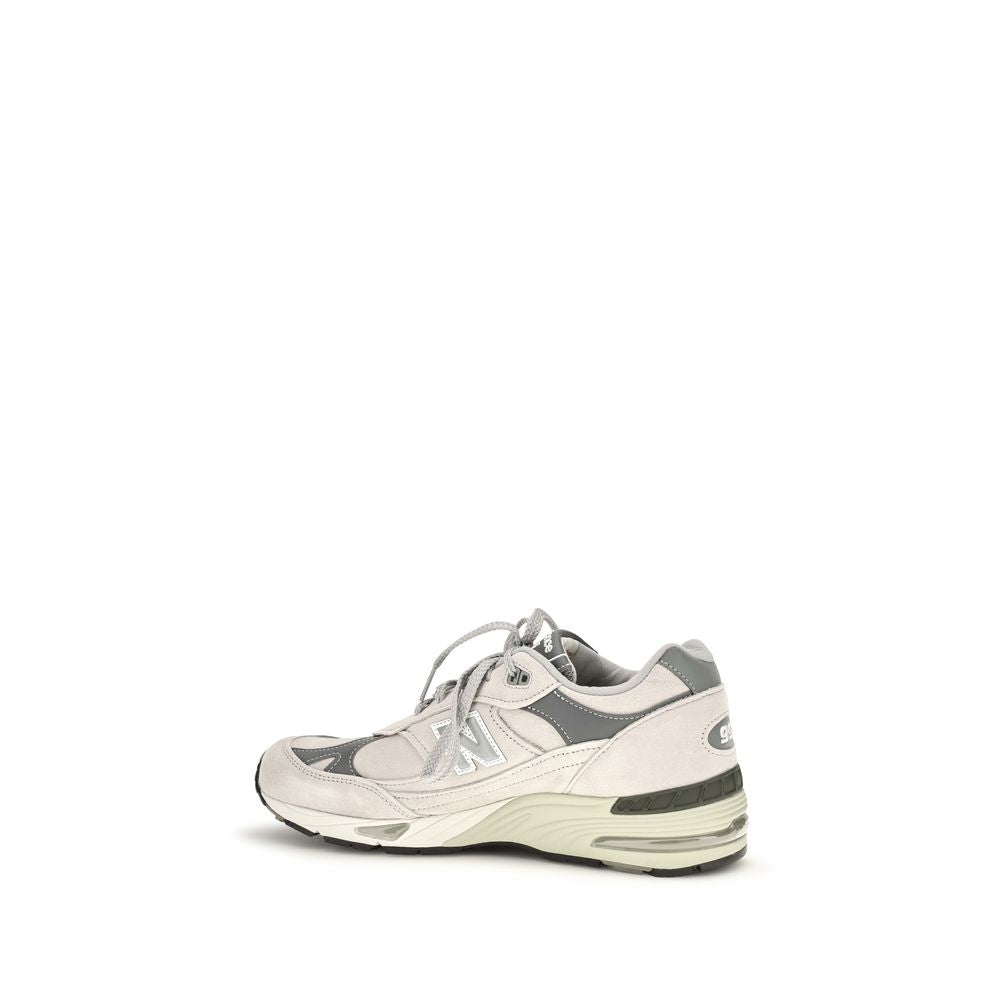 Athletic Sneakers by New Balance for men in nylon suede leather gray features an timeless silhouette from the Men's Athletic Nylon Suede Leather Sneakers collection, showcasing a timeless athletic style for a timeless look.