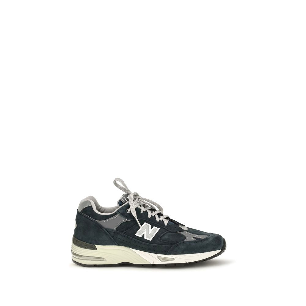Athletic Sneakers by New Balance for men in nylon suede leather blue presents a sleek silhouette, perfectly capturing the athletic style essence of Men's Athletic Nylon Suede Leather Sneakers with its sleek design and premium finish.