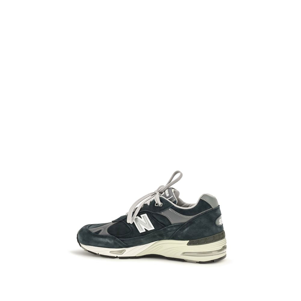 Athletic Sneakers by New Balance for men in nylon suede leather blue features an timeless silhouette from the Men's Athletic Nylon Suede Leather Sneakers collection, showcasing a timeless athletic style for a timeless look.