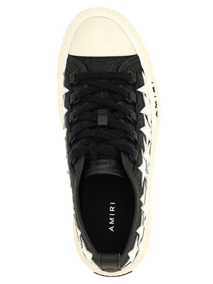 Sneakers by Amiri for women in calfskin leather bicolour, black & white presents a on trend silhouette from the Women's Low Top Calfskin Leather Sneakers collection, showcasing a on trend low-top style for an elevated aesthetic.