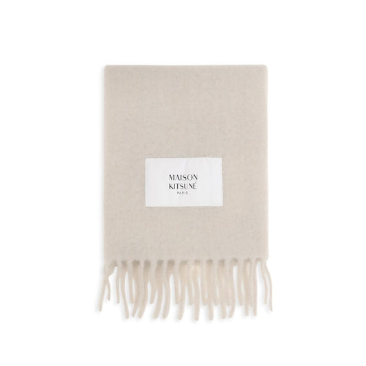Scarf by Maison Kitsuné for men in polyamide & alpaca wool beige & monogram presents a effortlessly chic silhouette, artfully capturing the essence of the effortlessly chic Polyamide & Alpaca Wool Wrap Fringes Scarf design for a sophisticated look.