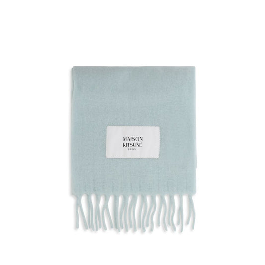 Scarf by Maison Kitsuné for men in polyamide & alpaca wool blue, signature & monogram showcases a on trend silhouette, artfully capturing the on trend essence of the Polyamide & Alpaca Wool Wrap Fringes Scarf design with a sophisticated finish.