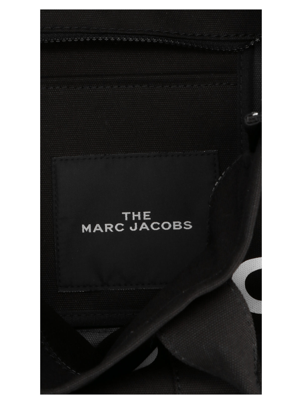 Large Shopper Tote Bag by Marc Jacobs for women in cotton canvas bicolour, black, white & print features an metropolitan chic Cotton Canvas Large Shopper Tote Bag design with a secure zipper, metropolitan chic , and versatile handle for a metropolitan chic look.