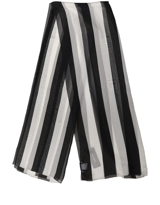 Scarf by Dolce & Gabbana for women in silk black, white & striped showcases a eye catching silhouette, artfully capturing the essence of the eye catching Silk Rectangular Stole Scarf design for a sophisticated look.