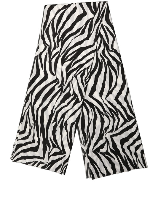 Scarf by Dolce & Gabbana for women in cotton lace black, white, zebra & print features a snug silhouette, perfectly showcasing the elegant drape and premium finish of the Cotton Lace Foulard Stole Scarf.
