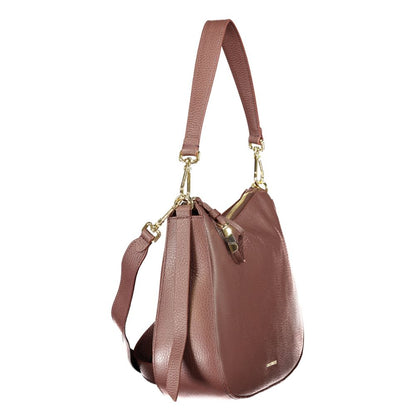 This Handbag by Coccinelle for women in leather and brown presents a sculptural silhouette featuring a secure zipper, ample internal-pockets, and versatile shoulder-strap, adjustable-strap & handle for a sculptural finish.