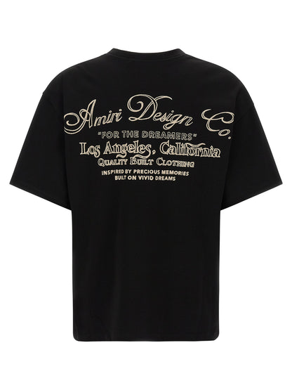 T-Shirt by Amiri for men in cotton black showcases a unassuming silhouette, artfully detailed with a refined round crew neckline and unassuming for a sophisticated, contemporary look.