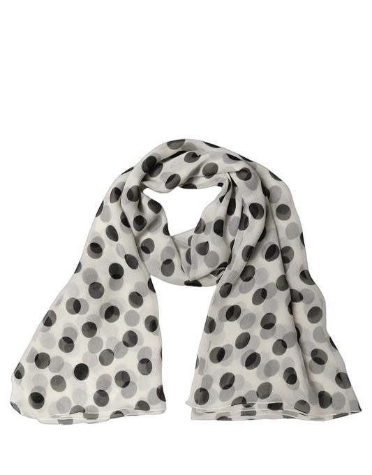 Scarf by Dolce & Gabbana for women in silk black, white & patterned showcases a on trend silhouette, artfully capturing the on trend essence of the Silk Rectangular Stole Scarf design with a sophisticated finish.