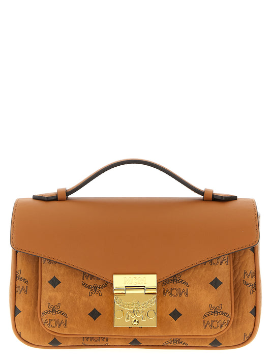 Medium Crossbody Handbag by MCM for women in polyethylene leather brown & print features a transformative sophistication silhouette, showcasing a secure , ample external-pockets, and versatile crossbody-strap, shoulder-strap, adjustable-strap & handle for a transformative sophistication look.