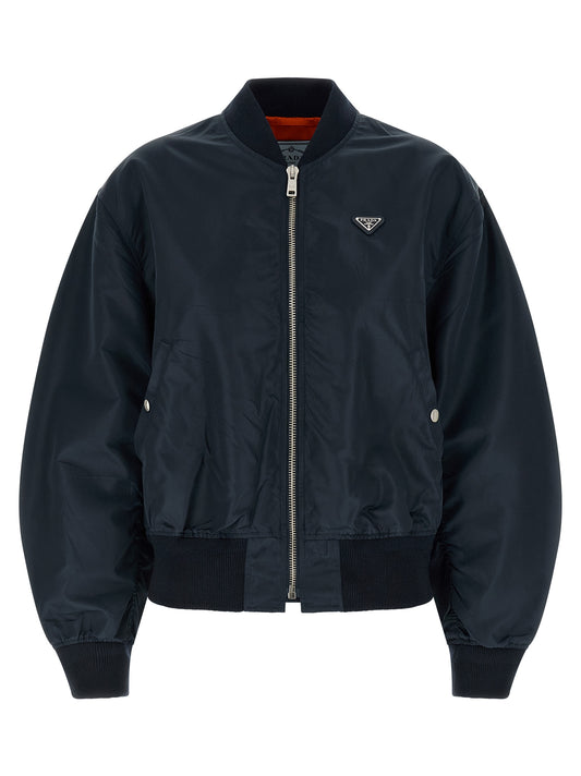 Bomber Jacket by Prada for women in nylon polyamide viscose & twill blue showcases a bohemian silhouette, artfully detailed with a bohemian high-neck neckline and signature pockets for a truly bohemian finish.
