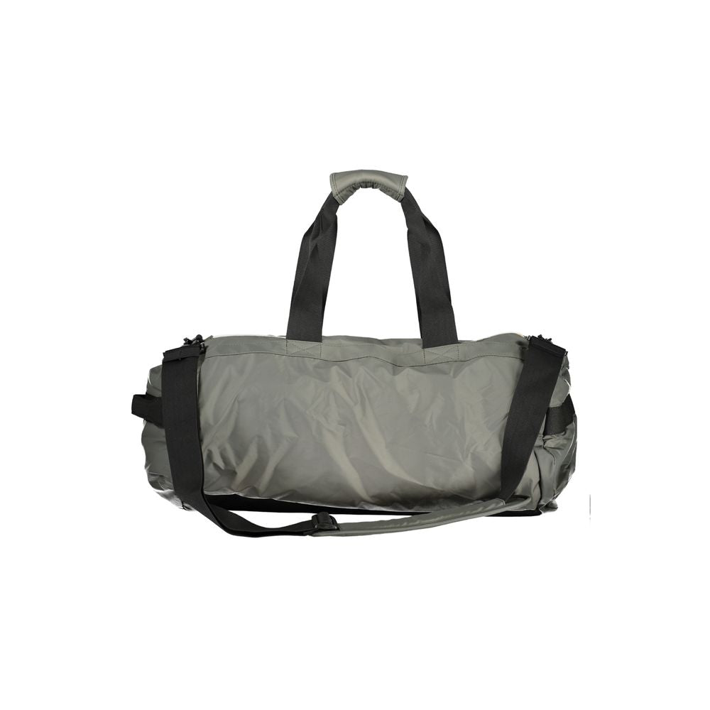 Travel Duffel Bag by K-WAY for men in polyamide green presents a fashionable Nomad Polyamide Travel Duffel Bag design, showcasing a secure zipper and fashionable external-pockets & internal-pockets with versatile adjustable-strap & handle.