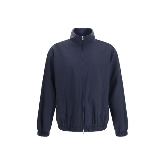Overcoat by Umit Benan for men in polyurethane & silk blue features a cosy chic silhouette, artfully detailed with a sophisticated high-collar neckline and premium water-resistant & pockets for a cosy chic finish.