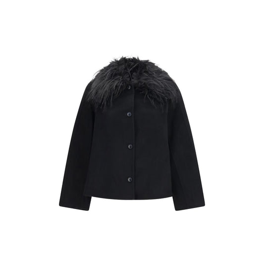 Overcoat by Loulou De Saison for women in cashmere merino wool & fur black showcases a enveloping silhouette, detailed with distinctive and a enveloping .