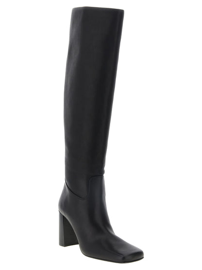 Over-The-Knee Boots by Khaite for women in calfskin leather black & natural features an avant-garde Women's Calfskin Leather Over-The-Knee Boots silhouette, defined by a sophisticated block-heel and a avant-garde square toe style.