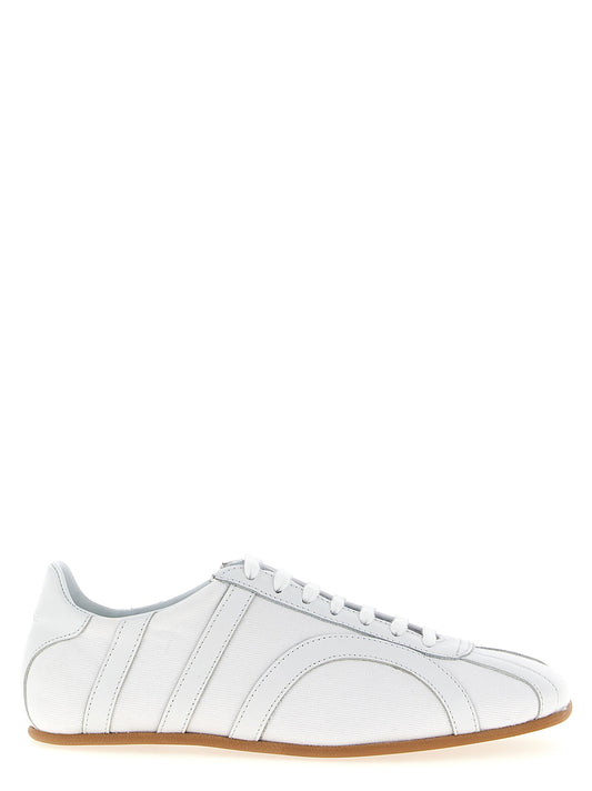 Sneakers by TOTEME for women in cotton canvas & leather white presents a on trend silhouette from the Women's Low Top Cotton Canvas & Leather Sneakers collection, showcasing a on trend low-top style for an elevated aesthetic.