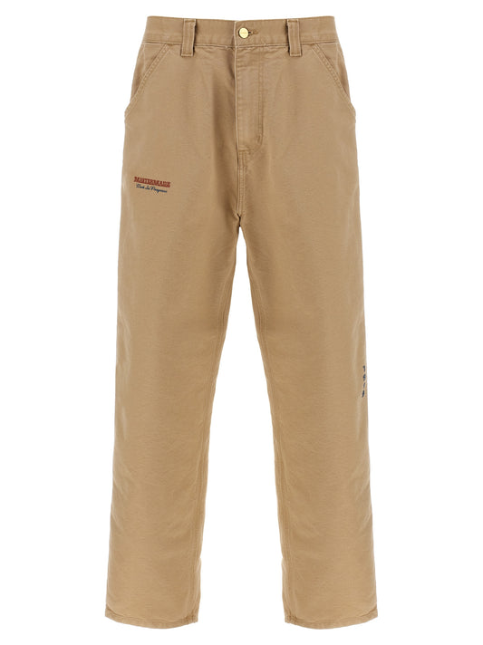 Trousers by Carhartt Wip for men in organic cotton beige & print features a tailored silhouette with a tailored straight-leg & wide, defined by its long and a sophisticated .
