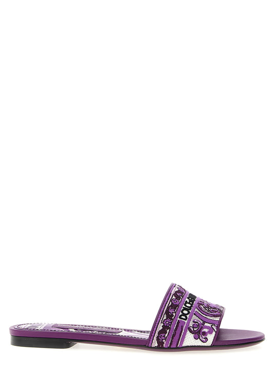 Sliders Flat Shoes by Dolce & Gabbana for women in lamb leather & cotton purple features an captivating silhouette, showcasing the captivating style of the Maiolica Women's Lamb Leather & Cotton Sliders Flat Shoes with its distinct and refined .