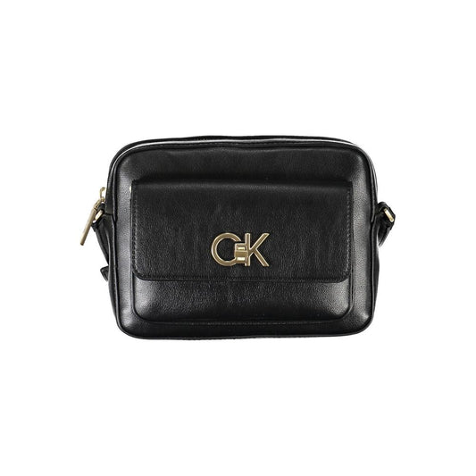 Shoulder Handbag by Calvin Klein for women in polyester & polyethylene black presents a ornamental silhouette, showcasing a secure zipper, ample external-pockets & internal-pockets, and versatile shoulder-strap for a ornamental finish.