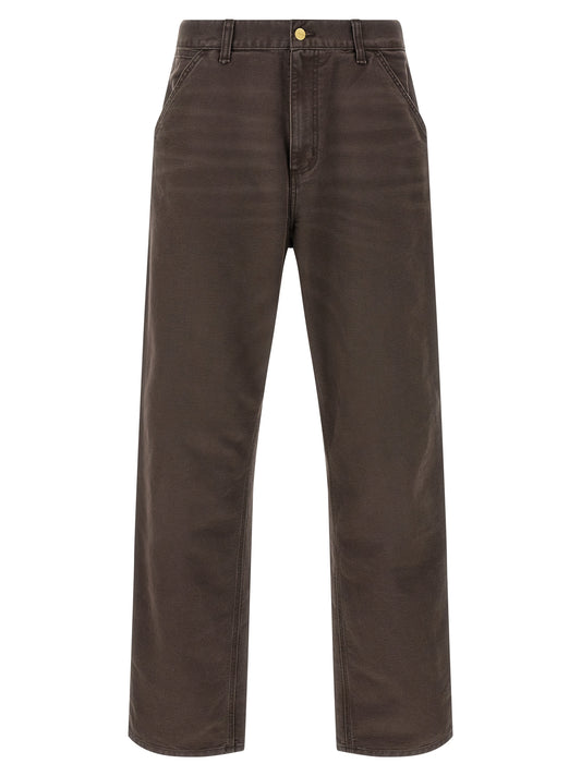 Trousers by Carhartt Wip for men in organic cotton brown features a sculptural silhouette, showcasing a sculptural straight-leg & regular-fit and long with a sophisticated for a sculptural finish.