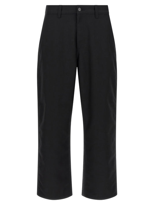 Trousers by Carhartt Wip for men in polyester twill & wool black presents a smart silhouette, meticulously detailed with a smart regular-fit & wide, a smart long, and a smart .