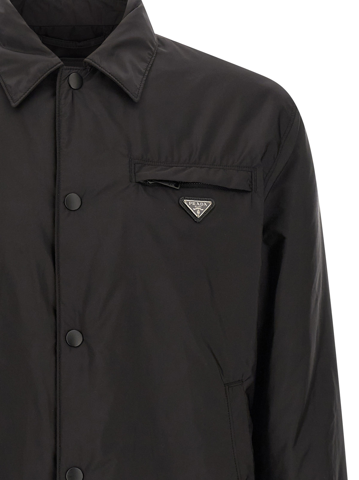 Overcoat by Prada for men in nylon black features a cosy chic silhouette, artfully detailed with a sophisticated shirt-collar neckline and premium pockets for a cosy chic finish.