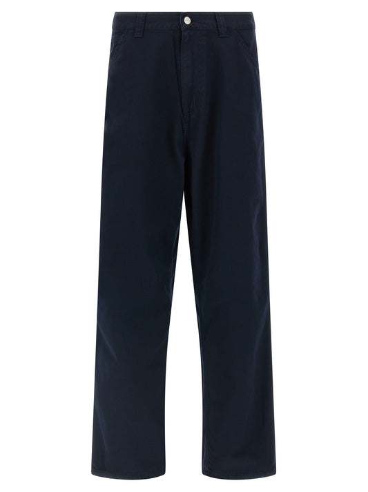 Trousers by Carhartt Wip for men in organic denim cotton & polyester blue features an sartorial silhouette, showcasing a precise straight-leg & wide and long with a sartorial for a refined look.