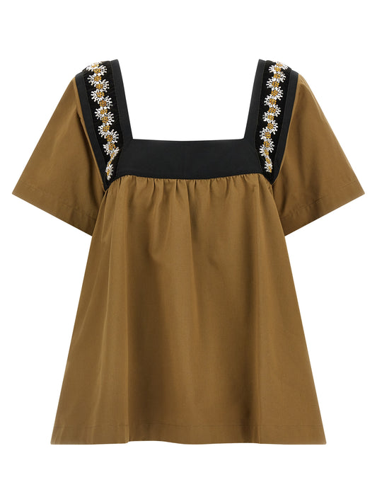 Blouse by Prada for women in velvet cotton beige presents a discerning silhouette, showcasing a sophisticated and for a truly discerning finish.