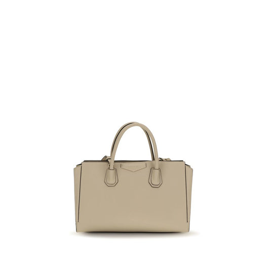 This Handbag by Givenchy for women in bos taurus calf leather and beige presents a sculptural silhouette featuring a secure , ample , and versatile for a sculptural finish.