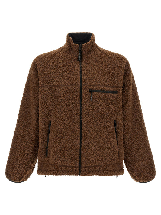 Overcoat by Gramicci for men in sherpa polyester & nylon black, brown & multicolor features an voluminous silhouette, showcasing distinct pockets and a voluminous high-neck neckline for a truly voluminous aesthetic.