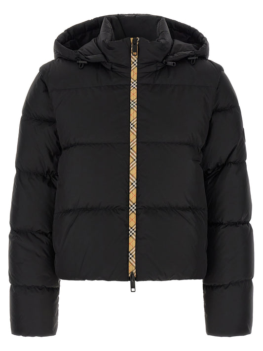 Hooded Jacket by Burberry for women in polyamide black features an utilitarian silhouette with a refined hooded neckline, showcasing sophisticated hooded & insulated for an utilitarian aesthetic.
