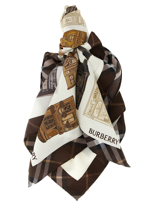 Scarf by Burberry for women in silk satin brown, multicolor & print showcases a warm silhouette from the Silk Satin Scarf collection, offering a warm drape that exudes sophisticated luxury.