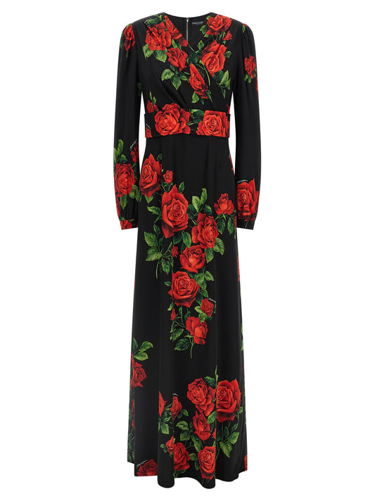 Dress by Dolce & Gabbana for women in silk black, red, rose & print features an cute silhouette, detailed with a long-sleeve and wrap v-neck neckline that elegantly flows into a cute long.