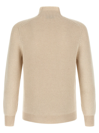 Cardigan by Brunello Cucinelli for men in cashmere beige showcases a captivating silhouette, artfully detailed with a captivating and turtle neckline for a truly sophisticated captivating look.