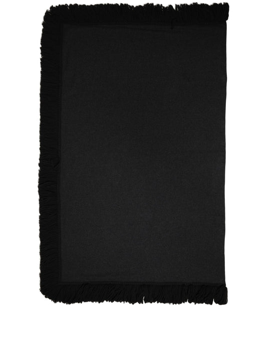 Scarf by Dolce & Gabbana for women in virgin wool black showcases a eye catching silhouette, artfully capturing the essence of the eye catching Virgin Wool Rectangular Fringes Scarf design for a sophisticated look.