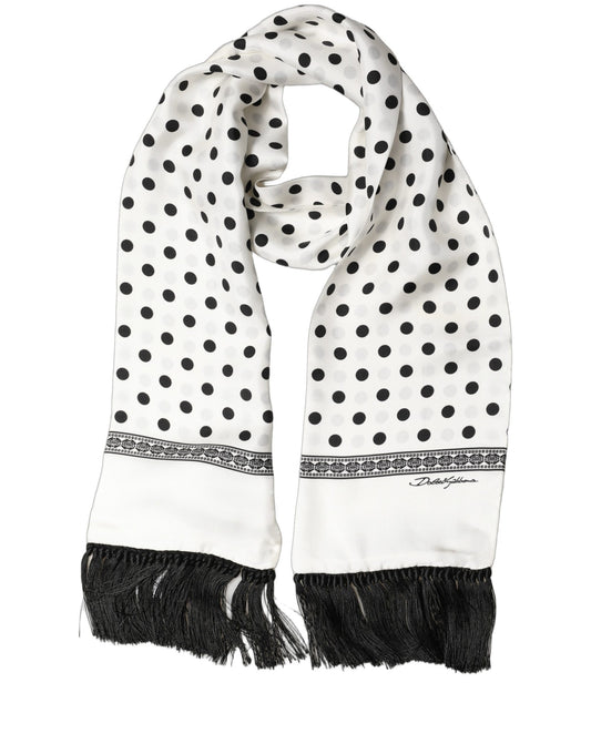 Scarf by Dolce & Gabbana for women in viscose & silk black & white showcases a warm silhouette from the Viscose & Silk Rectangular Wrap Fringes Scarf collection, offering a warm drape that exudes sophisticated luxury.